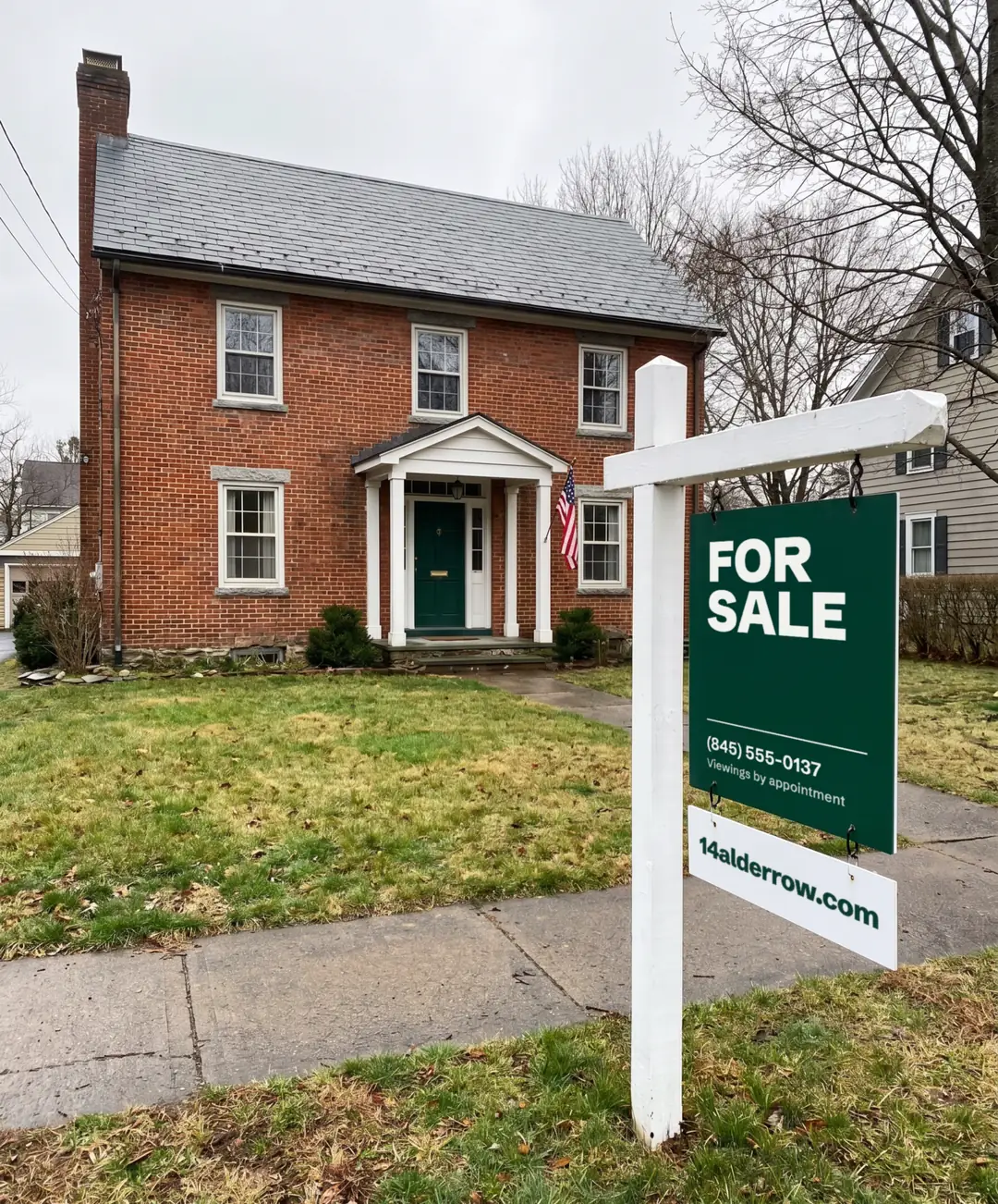 A for sale sign on the lawn in front of 14 Alder Row, a red brick house. The rider under the sign reads 14alderrow.com.