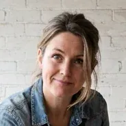 Rhona, who restores the furniture at Coburg Street, in the workshop